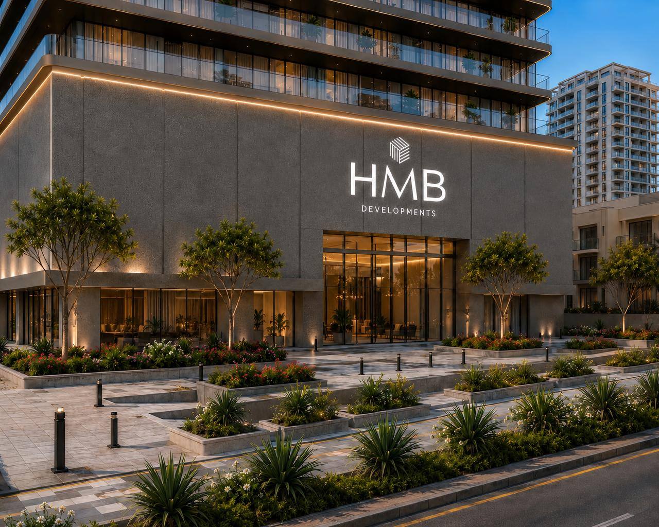 Beverly Crown par HMB Développements : façade moderne avec éclairage, végétation et logo HMB. DUBAI - Haaz Properties